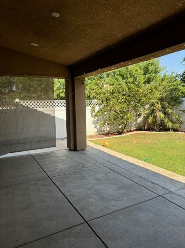 Building Photo - Elegant 4-Bedroom Home with Paid Solar in Gated Village Green Community