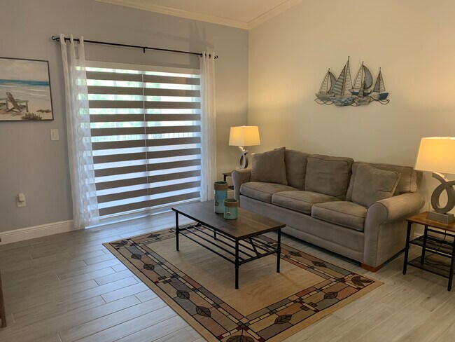 Newly tinstalled window treament - 2352 57th Cir