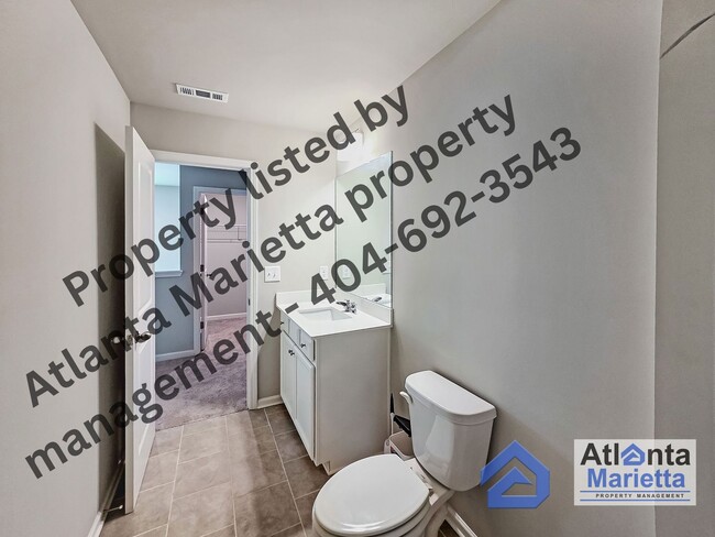 Building Photo - Spacious & Stylish 4BR/3.5BA Townhome Near...