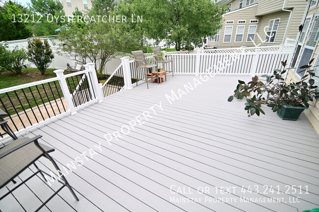 Building Photo - Immaculate 5 Bedroom SFH W/ Private Deck &...