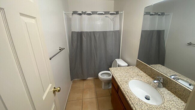 Building Photo - Renovated Townhome, Attached Garage, in Gated HOA Community *READ*