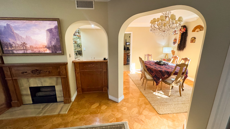 Living room attached to dining room and wet bar - 8455 Fountain Ave