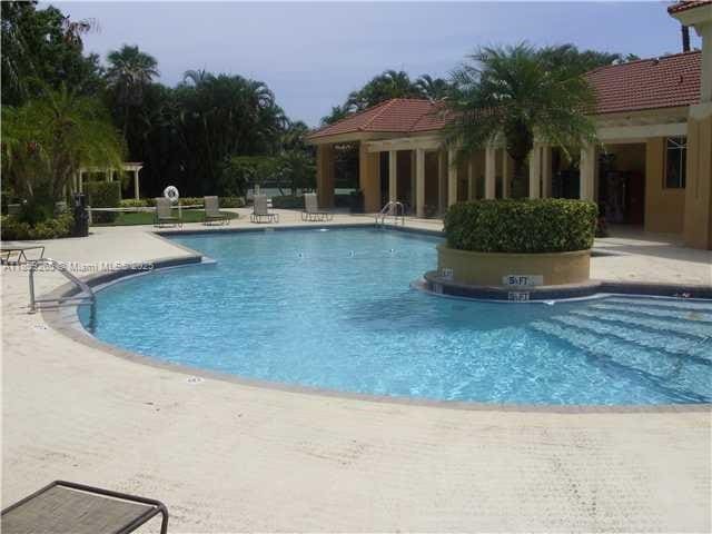 Building Photo - 4879 Via Palm Lakes