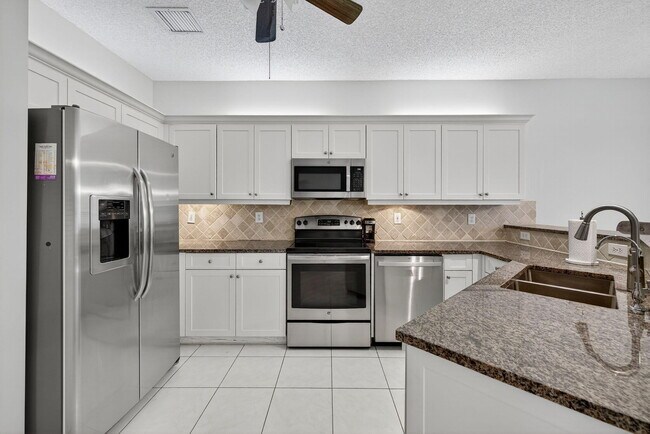Building Photo - 6468 NW 78th Pl
