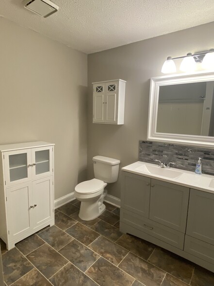 Upstairs bathroom new vanity - 1425 Mineral Springs Rd