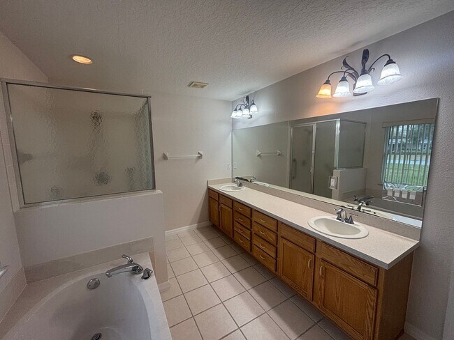 Building Photo - Move in ready 3/2 in 55+ community - near everything