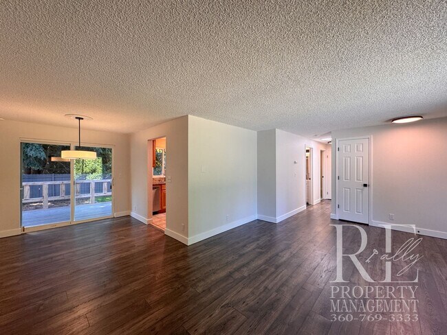 Building Photo - Renovated Poulsbo Home with A/C, & Covered Outdoor Living