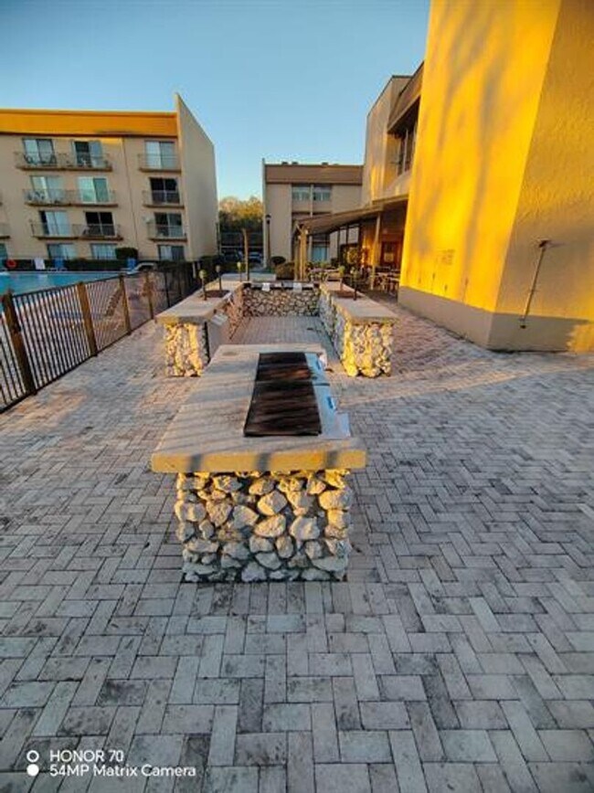 Building Photo - Welcome to Tampa Racquet Club – Where Comfort Meets Convenience!