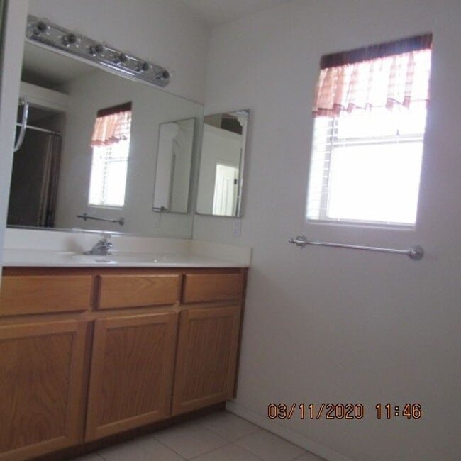Building Photo - 3 bedroom 2 bath home with 3 car garage and RV parking