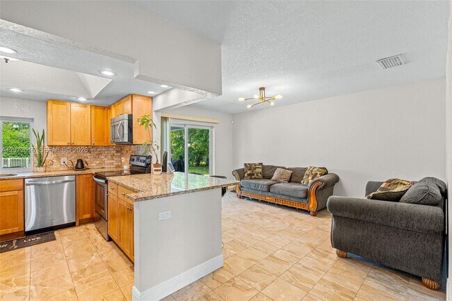 Building Photo - 9240 NW 12th Ave