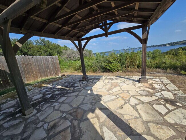 Building Photo - Stunning 1 Bedroom Condo with Gorgeous Views of Granbury Lake