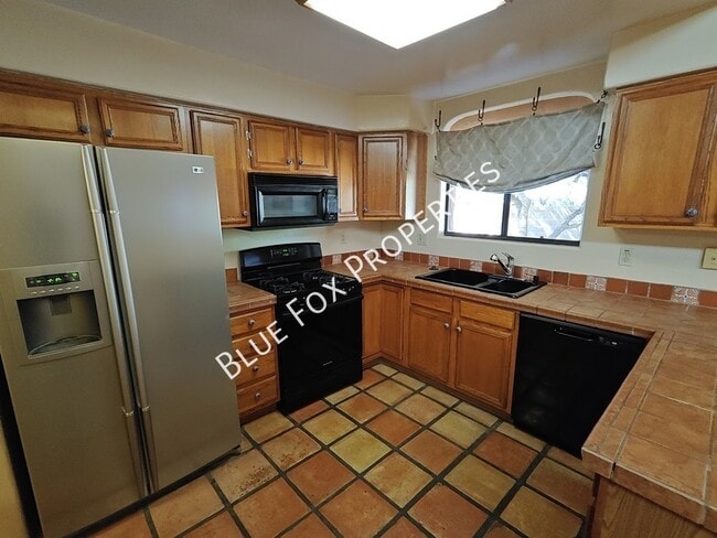 Building Photo - 9097 N Jessy Ln