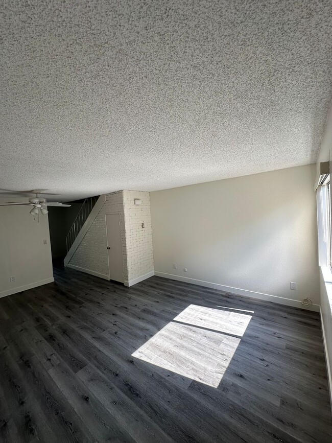 Building Photo - BRIGHT 2BR TOWNHOME IN GENESEE HIGHLANDS W...