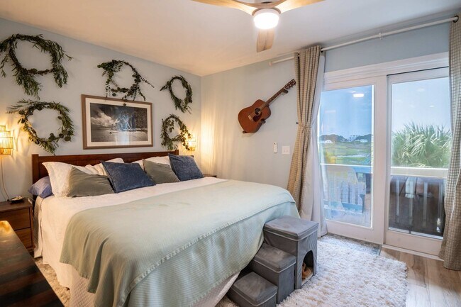 Building Photo - OFF-SEASON FURNISHED OASIS JUST STEPS FROM THE SAND