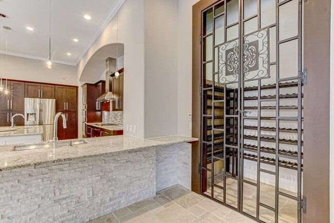 Building Photo - Stunning 5-Bedroom Pool Home on Nearly 2 A...