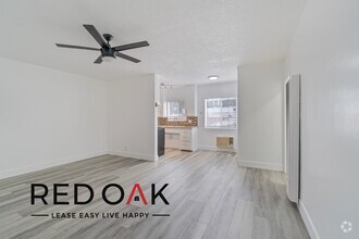 Building Photo - Spacious Two Bedroom with Stunning Hardwoo...