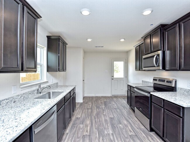 Building Photo - 4BR/2BA - 1794 SF Home in with LUXURY VINY...