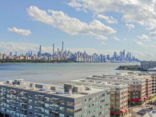 Building Photo - 1/Bedroom at Edgewater's top waterfront lo...