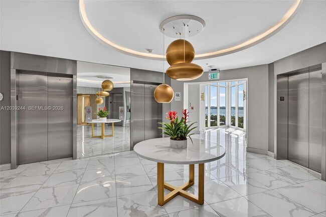 Building Photo - 10275 Collins Ave