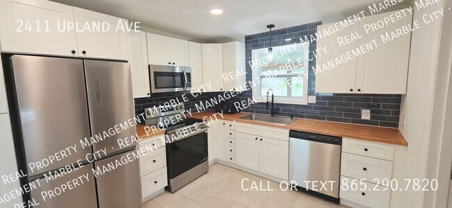 Building Photo - 2411 Upland Ave