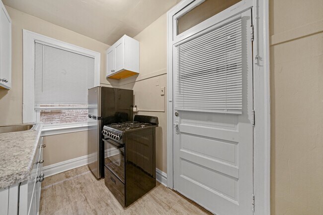 Building Photo - Sunny, Convertible Studio with Two Rooms a...