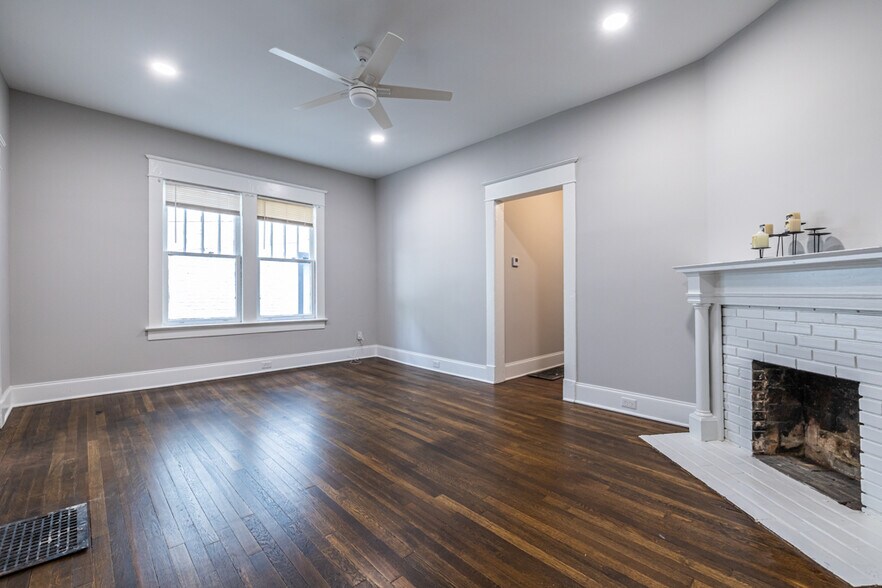 Spacious front room with decorative fireplace - 1450 Piedmont Ave NE