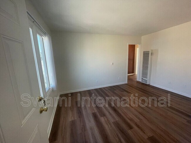Building Photo - 9449 Normandie Ave