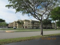 Building Photo - 8285 Sunrise Lakes Blvd