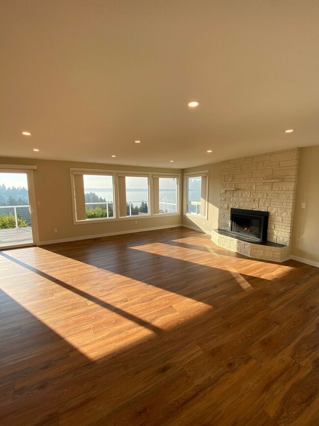 Building Photo - Modern 4-Bedroom Home with Panoramic Water & Mountain Views