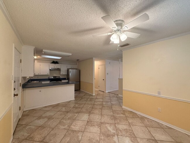 Building Photo - RENT REDUCTION - AVAILABLE NOW!