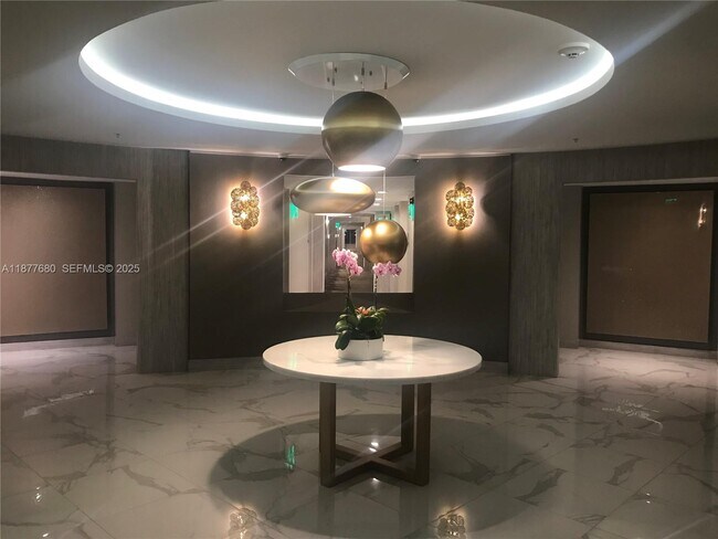 Building Photo - 10275 Collins Ave