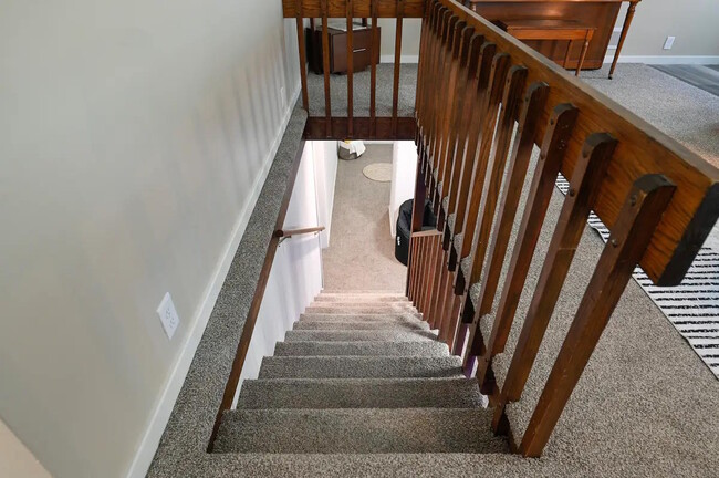 Stairs in Living Room to Lower Level - 8109 Grant St