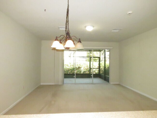 Building Photo - Spacious 3/2.5/1 Townhouse, Lawn Service, Garbage and Water Included