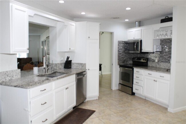 Building Photo - 7655 Cardiff Ct N