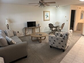 Building Photo - Experience Maintenance-Free 55+ Living at The Cove at Tavares Village!