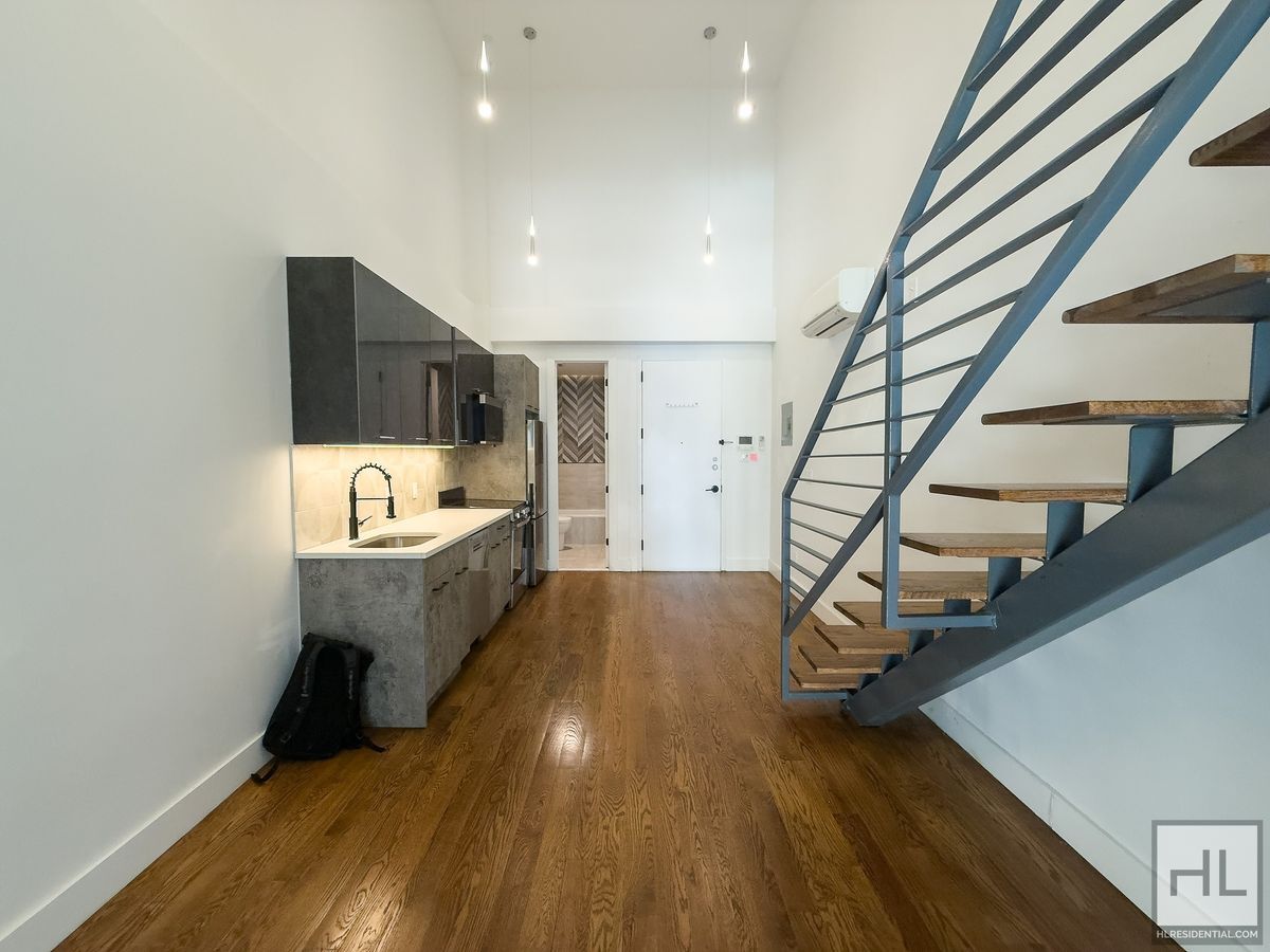 Building Photo - Stunning Two-Bedroom Duplex with Soaring 1...