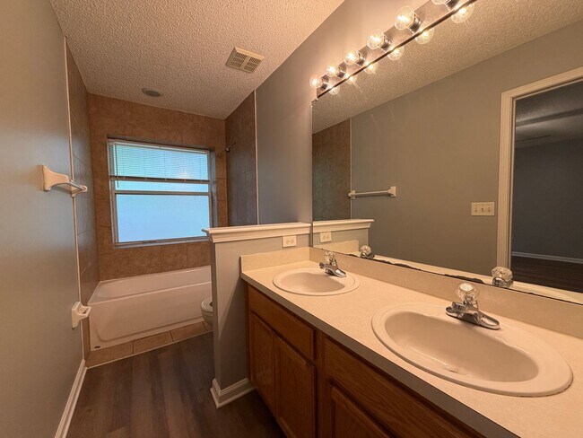 Building Photo - COMING SOON - Secret Harbor Three Bedroom Home