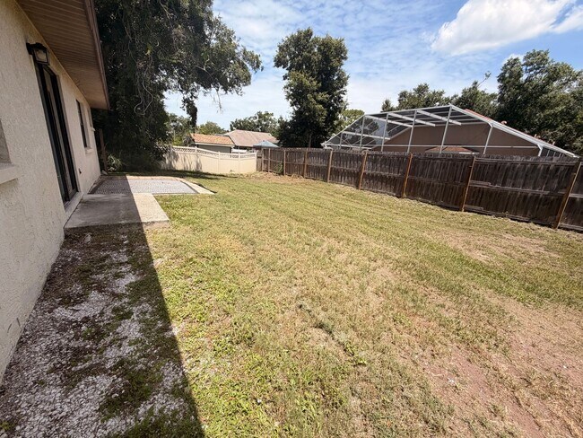 Building Photo - 2/2 Bedroom house with 1 car garage and fenced yard.