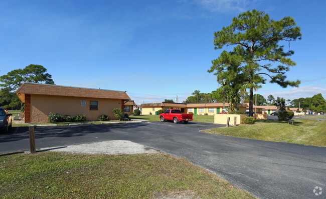 Building Photo - Coral Pines Apartments