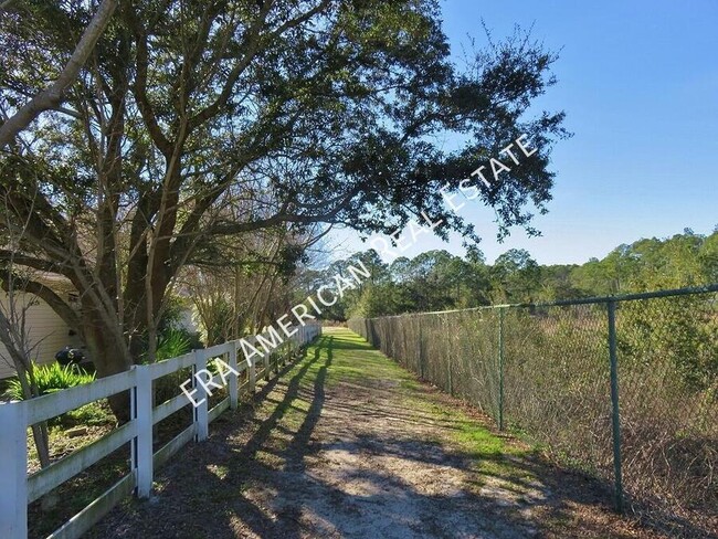 Building Photo - Home overlooking a pond