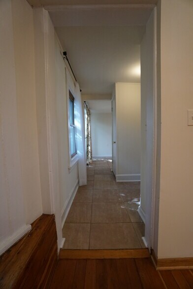 Walkway from living room to Bathroom and Kitchen - 224 E Benton Ave