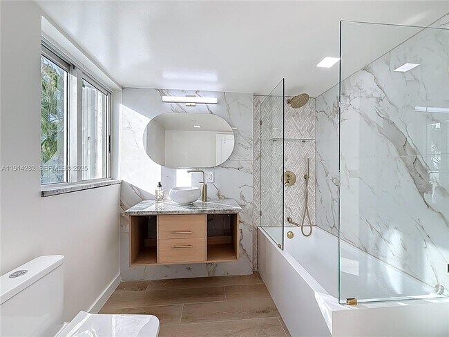 Building Photo - 5900 Collins Ave