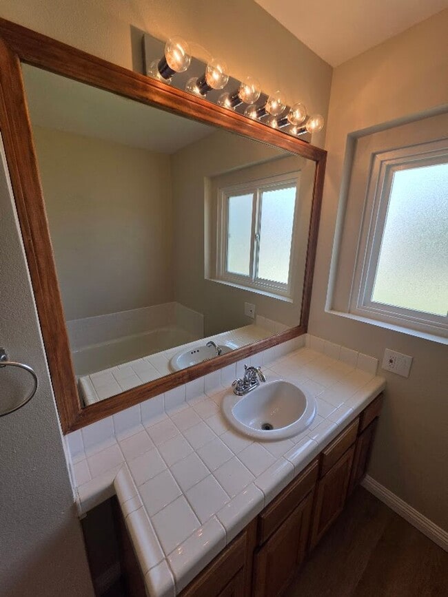 Building Photo - TURNKEY-RENT READY SPACIOUS 2BD/2BA HOME, 2-CAR GARAGE WITH AN AUTOMATIC ROLL-UP DOOR, LARGE COVE...