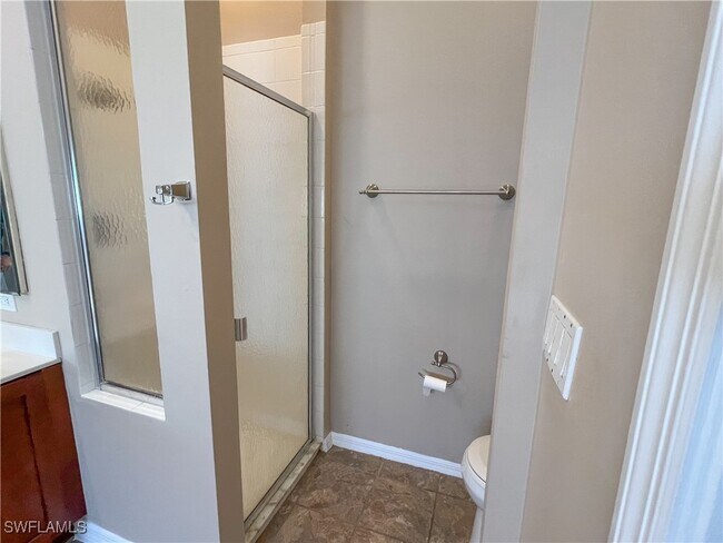 Building Photo - 9511 Cypress Dr N