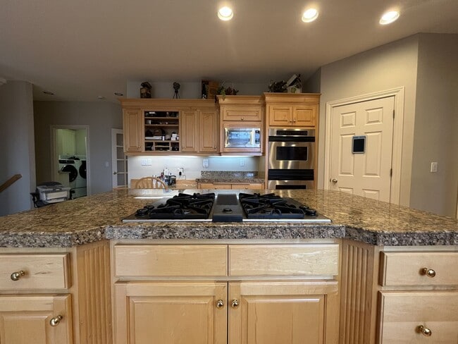 Building Photo - Executive-Style Northwest Heights Home with Forest Views and Refined Architectural Details