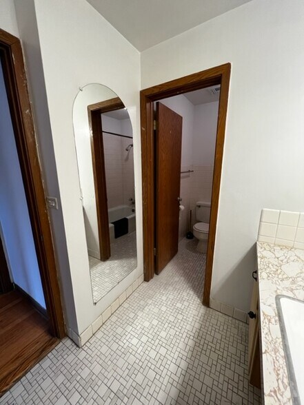 Toilet/shower separate from bathroom vanity - 6840 W North Ave