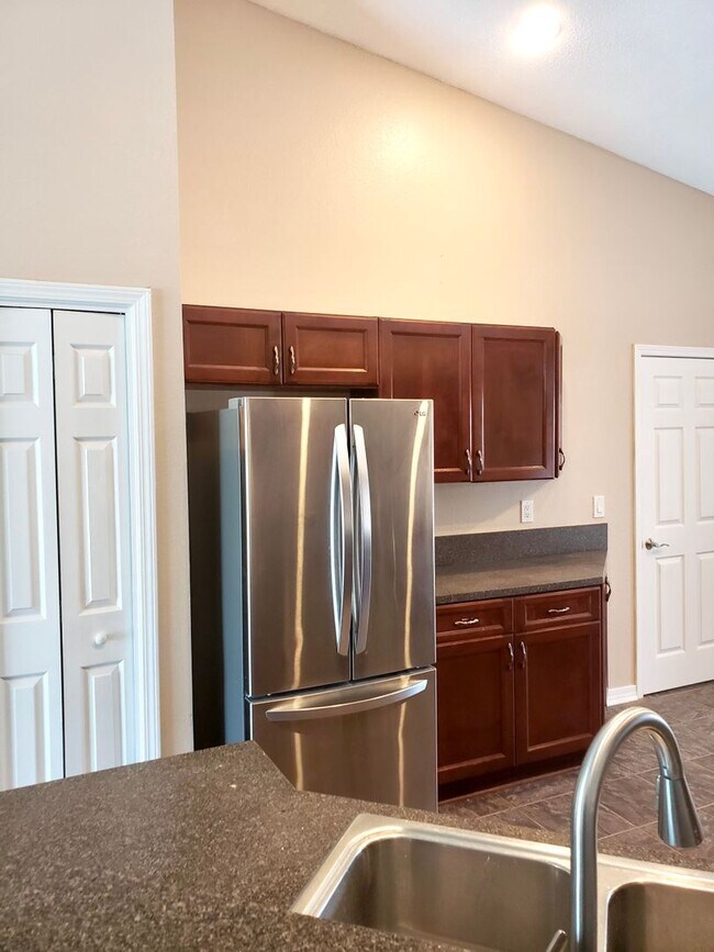 Building Photo - Beautiful home with Swimming Pool in the Hammocks. 4 bedroom 2 bath -Pool lawn service included!!!