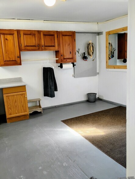 Spacious and bright with mirrors and ceiling light on 3 way switches. - 44 Coolidge St