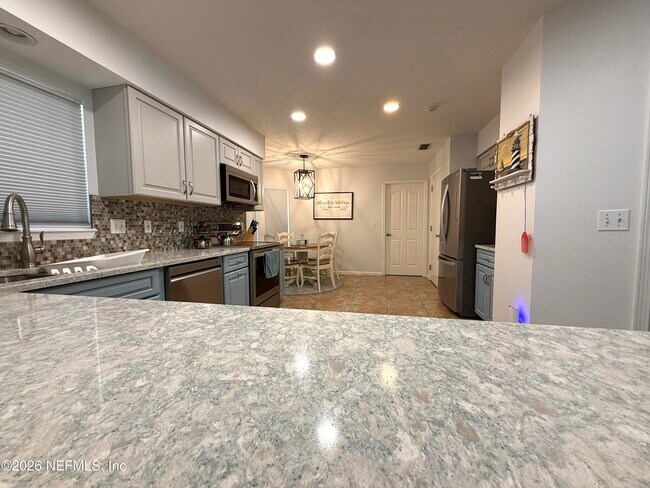 Building Photo - 8997 Adams Walk Dr