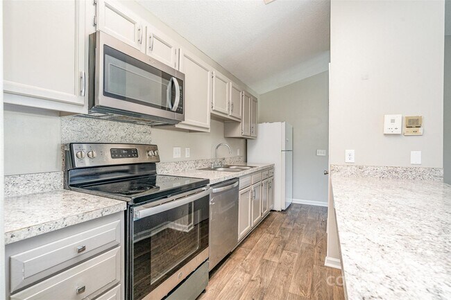 Building Photo - 6165 Meadow Rose Ln